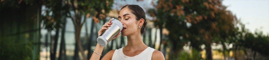 Woman drinking water.