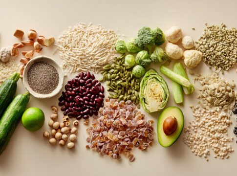 Variety of whole foods, seeds, nuts, and vegetables.
